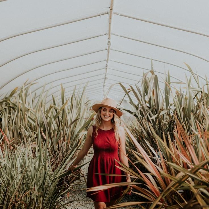 Anya Rao, Lead Design Curator at Shore Meander Still, reviewing corporate floral arrangements